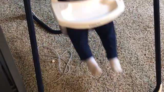 Baby swings on baby booster seat and hits head on rail