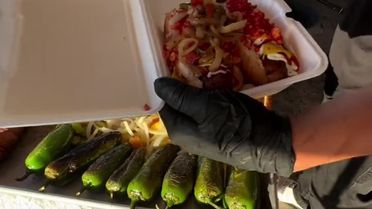 the cop and his friends stop to eat hot dogs