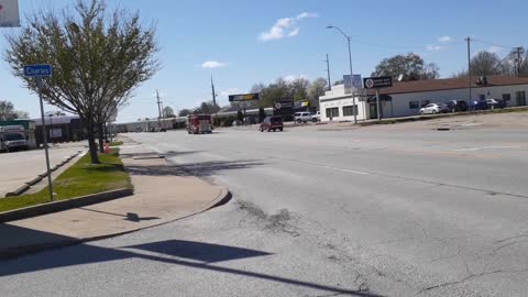 Fire truck gets delayed by passing train