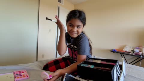 My daughter wanted to show me her make up routine.