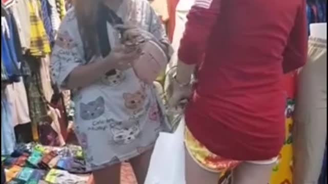 Two beautifull Filipina teen caught using Fake money