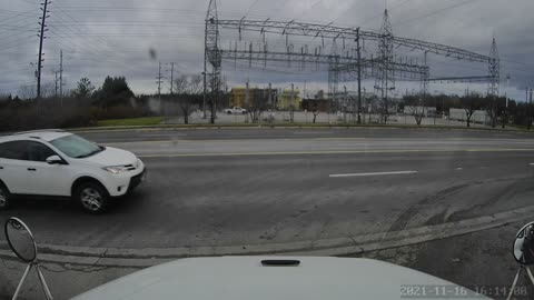 Semi Has Close Call with Tight Turning Bus