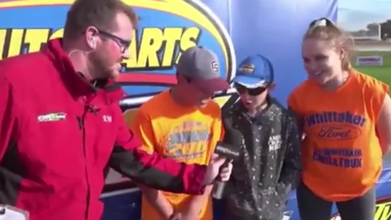 Kid Sneaks In "Let's Go Brandon!" During Live TV Broadcast