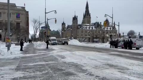 UN Police in Ottawa take Souvenir Photos after WAR CRIMES COMMITTED AGAINST Freedom Convoy 2.20.22