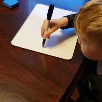 4 YEAR OLD WRITING HIS NAME