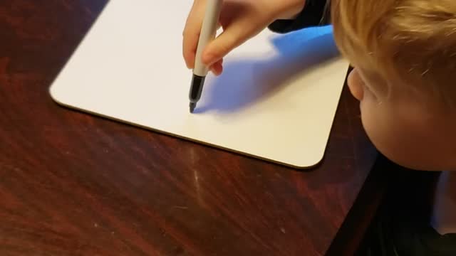 4 YEAR OLD WRITING HIS NAME