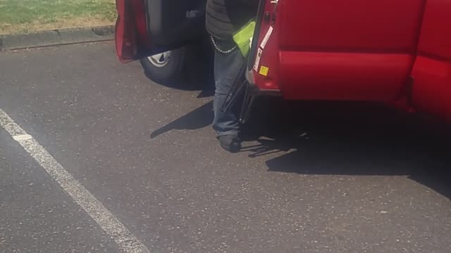 Man Sitting in Front of a Church Begging for Money with a Sign But Drives a 2014 Toyota Tacoma