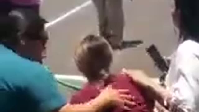 BREAKING - Videos show parents being held down by cops outside during shooting spree 🤬