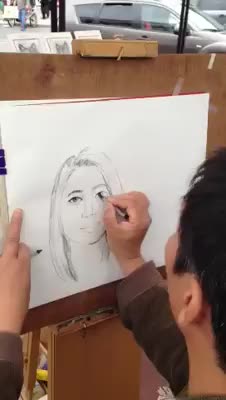 Getting Picture Drawn in at the Byward Market.....