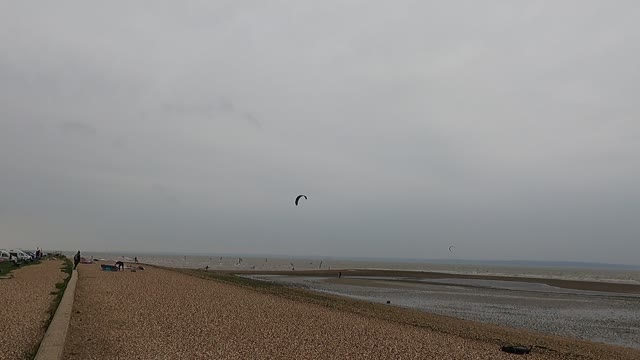 Kite surfers. On a windy day at beach