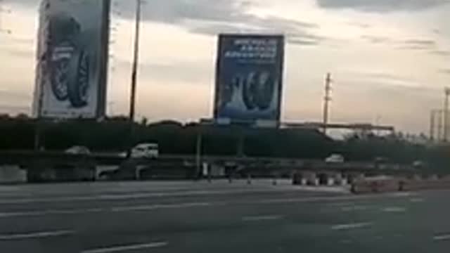 Billboard advertisements along the interstate in the Philippines