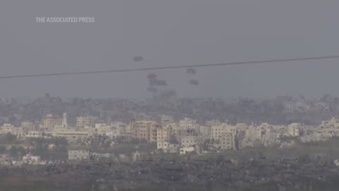 Air drops of aid parachuted into Gaza Strip