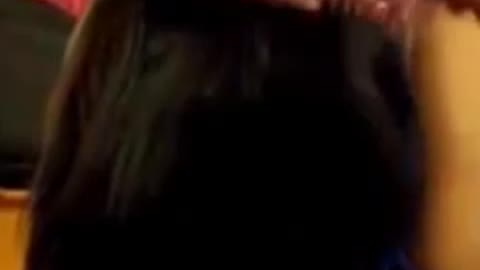 My hubby brushing my hair.