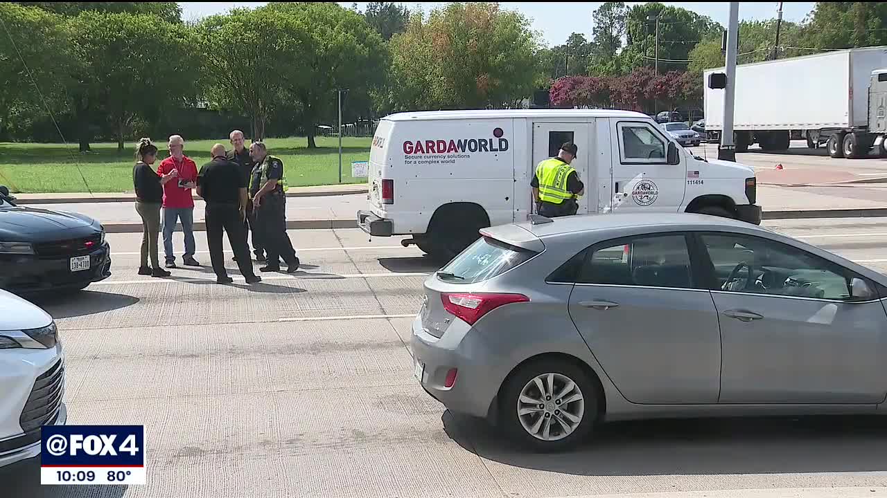 4 suspects in custody, armored car driver shot during robbery near bank in Carrollton