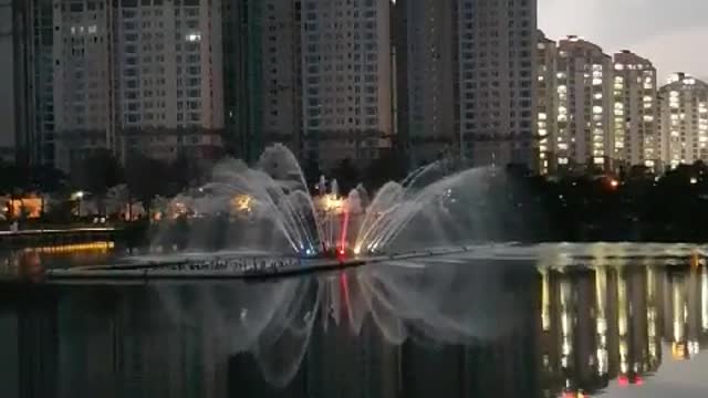 A fountain show in a park