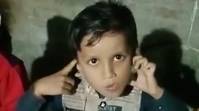 Cute indian boy scarring injection