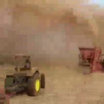 Dust storm machine in operation.