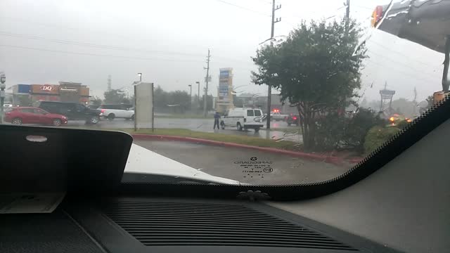 Paying Respects in the Pouring Rain