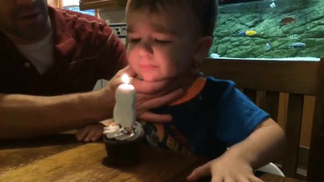 Kid is Terrible at Blowing out Candles