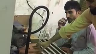 Small cartons tape tapes sealing machine operated in Indian customers factory