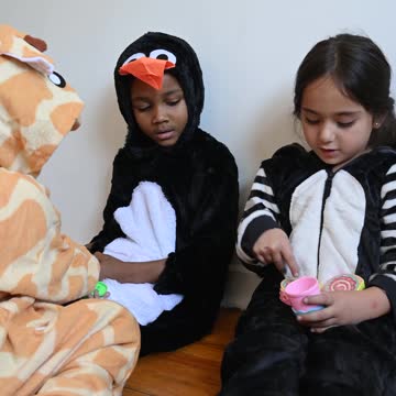 Kids Playing Toys on the Floor