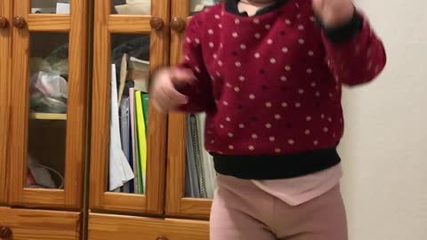 The cute baby is singing