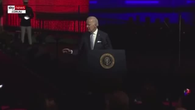 Biden: 'God bless you all, Democracy'.. then turns to shake the hand of.... no one!