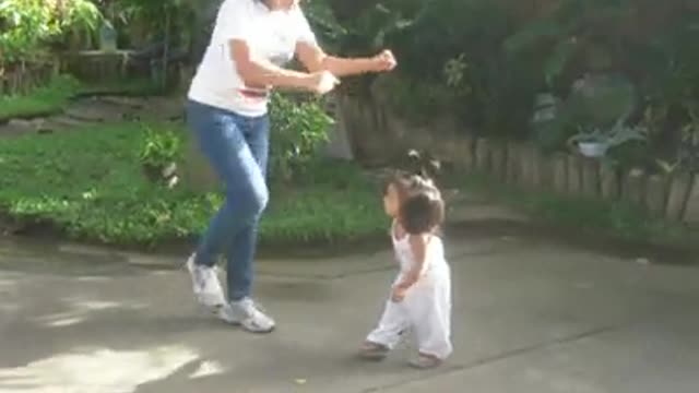 Mother and 2 Year Old Baby Girl Dance The Running Man