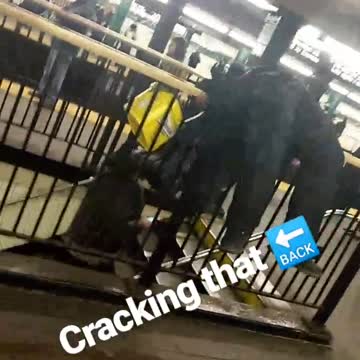 Cracking that back man lays on subway stairs railing