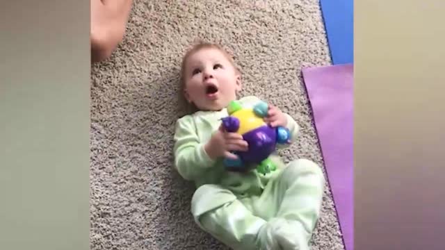 Funny baby with dad enjoy