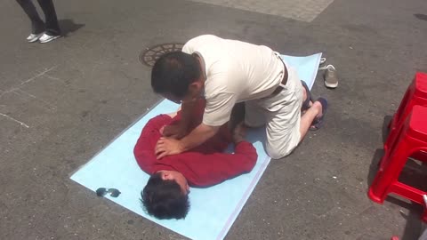 Luodong Briefly Massages Chinese Man In Red Shirt