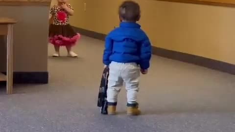 Adorable baby tries to ask a girl on a date. 😍😍