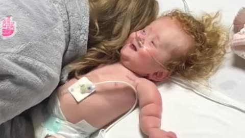 Baby sliding down hospital bed