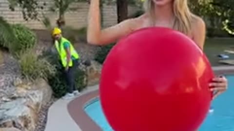 She pops the balloon