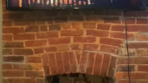 Fire on the fireplace.