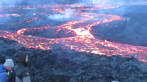 People Standing Close To Volcanic Eruption on Iceland 2021