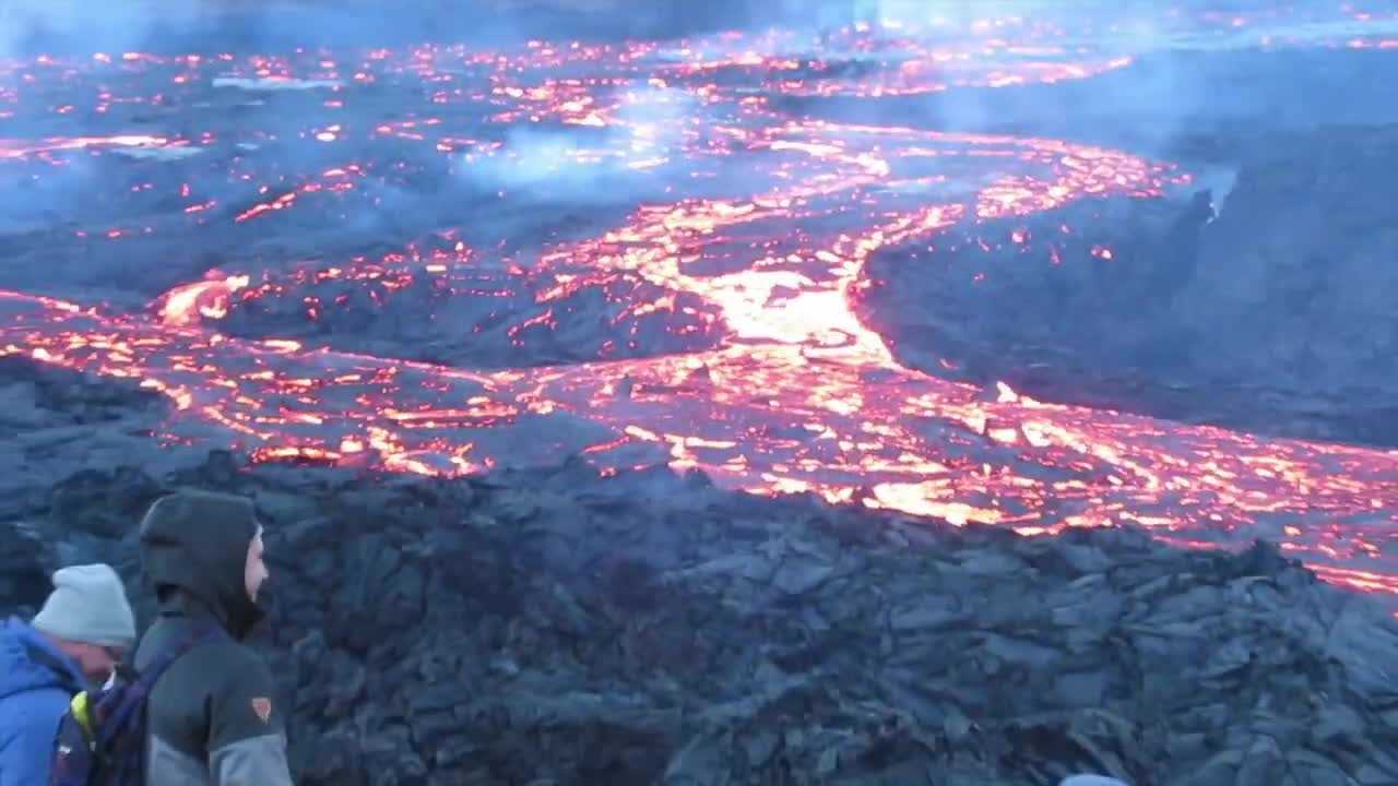 People Standing Close To Volcanic Eruption on Iceland 2021