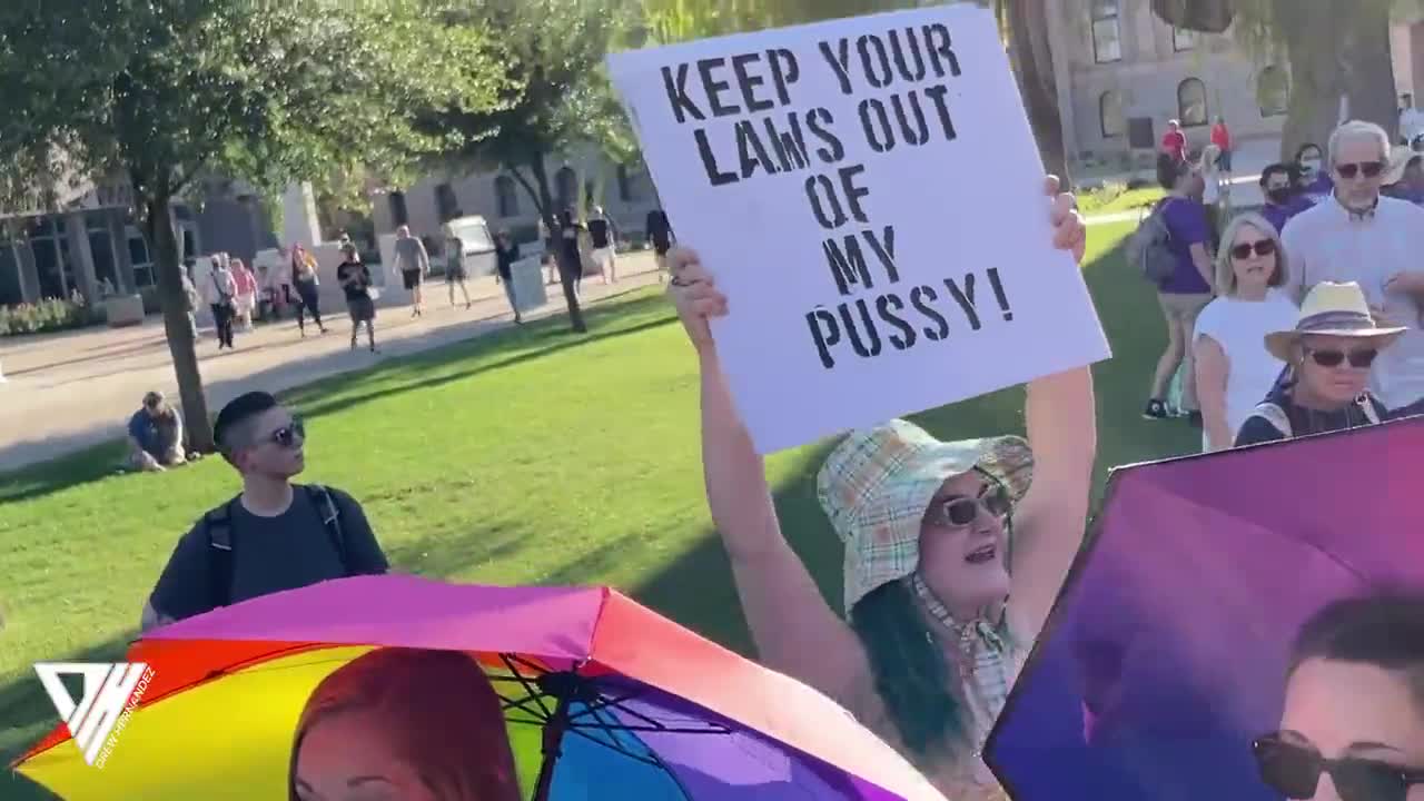 'Man' tells everyone to 'keep their laws' out of 'his' pussy in 'sex strike' at Roe v Wade protest.