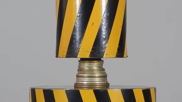Hydraulic press VS Coins