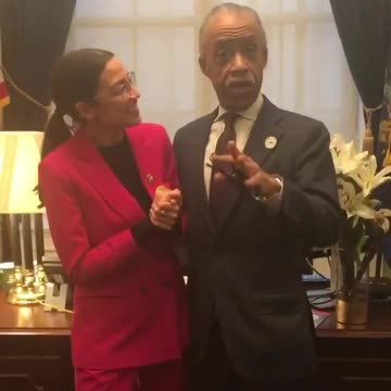 Ocasio-Cortez dancing with Al Sharpton