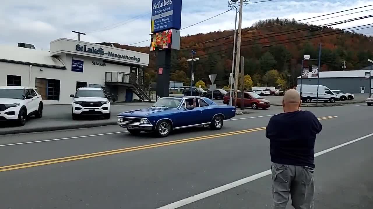 Impatient Man Slices Tire During Trump Train Parade