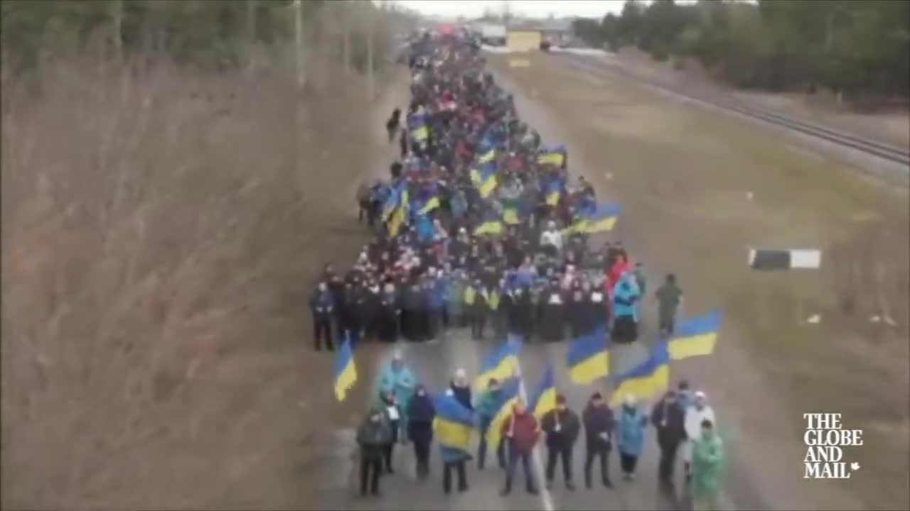 Ukrainians blockade road to stop Russian advance on nuclear power plant