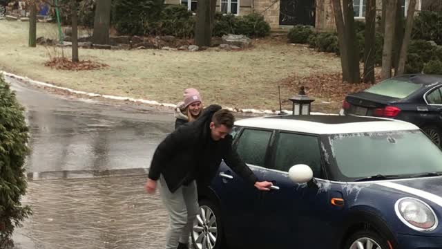 Teamwork Helps Navigate Super Slippery Driveway