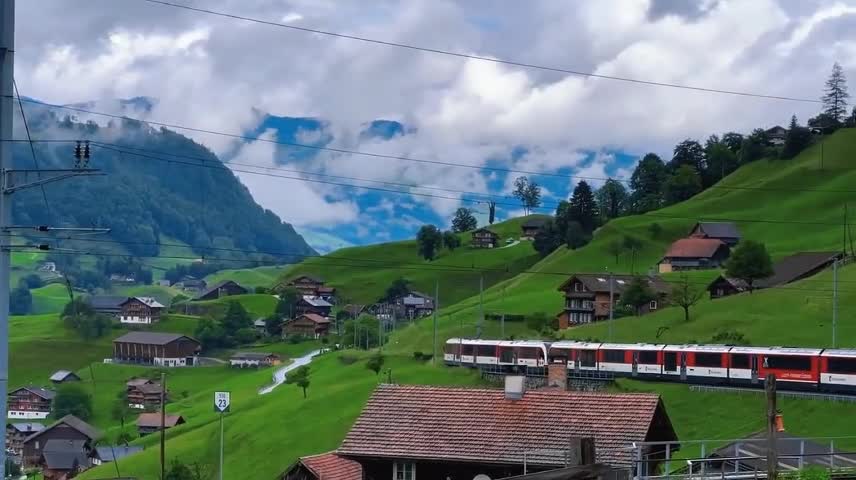 The little train passes through the quiet town