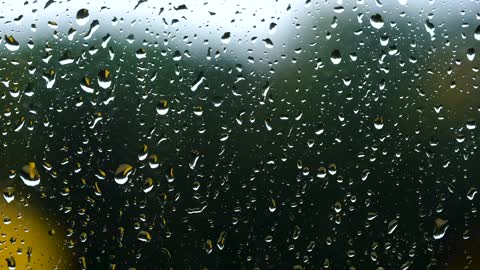 Rain behind glass/Pluie derrière une vitre