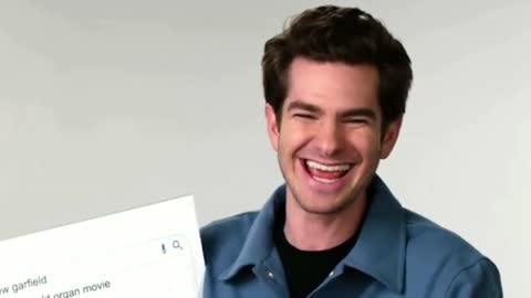 Andrew Garfield laughing.