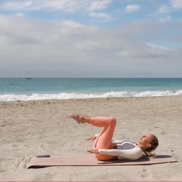Reach the arms overhead for core work