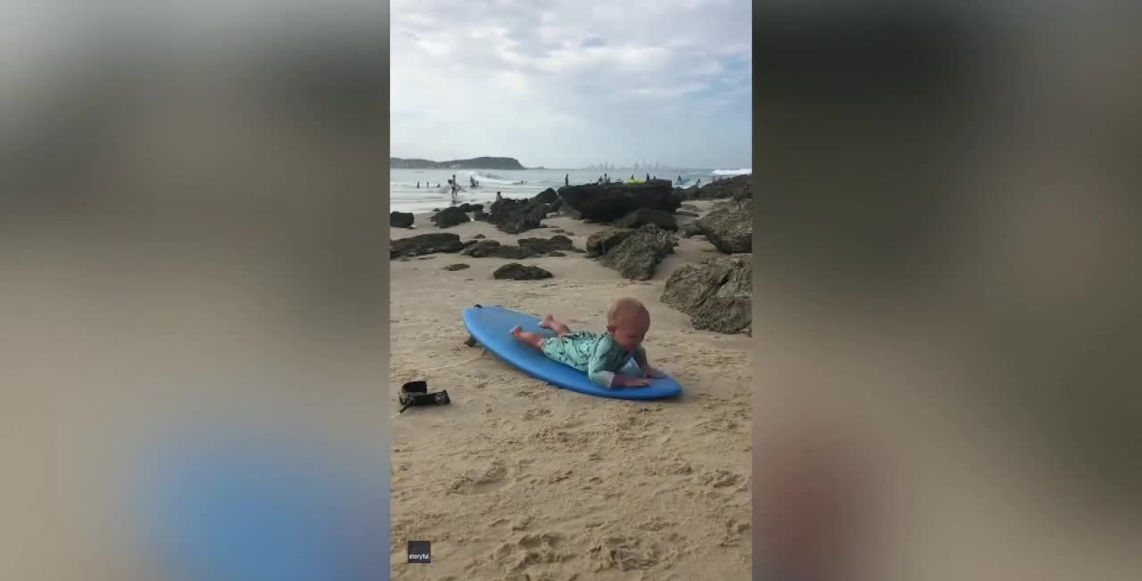 This cute toddler can grow into a great surfer