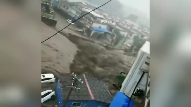 ⁣China: Heavy Rains Cause Deadly Floods in HENAN Province