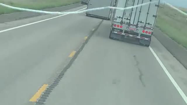 Semi Swerves to Avoid Slamming Overtaking Car